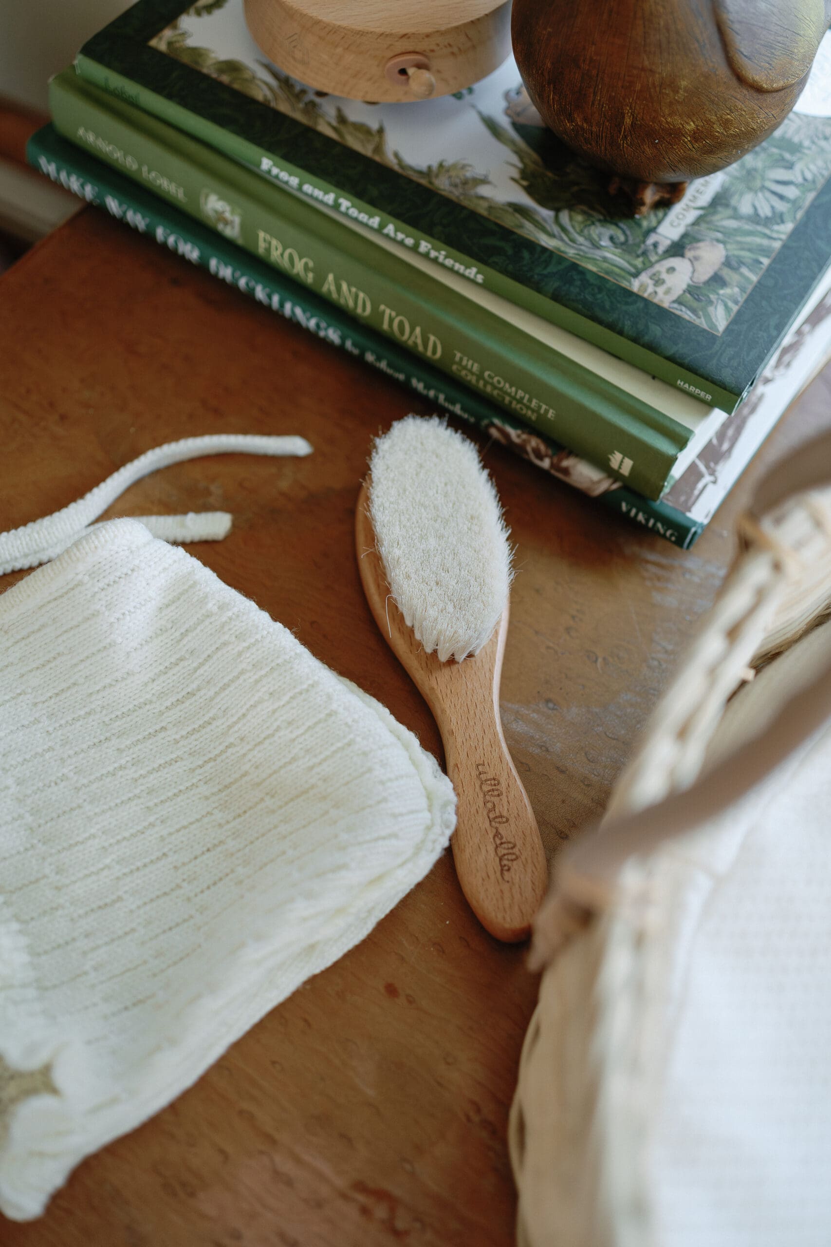Vintage newborn baby hairbrush on changing table