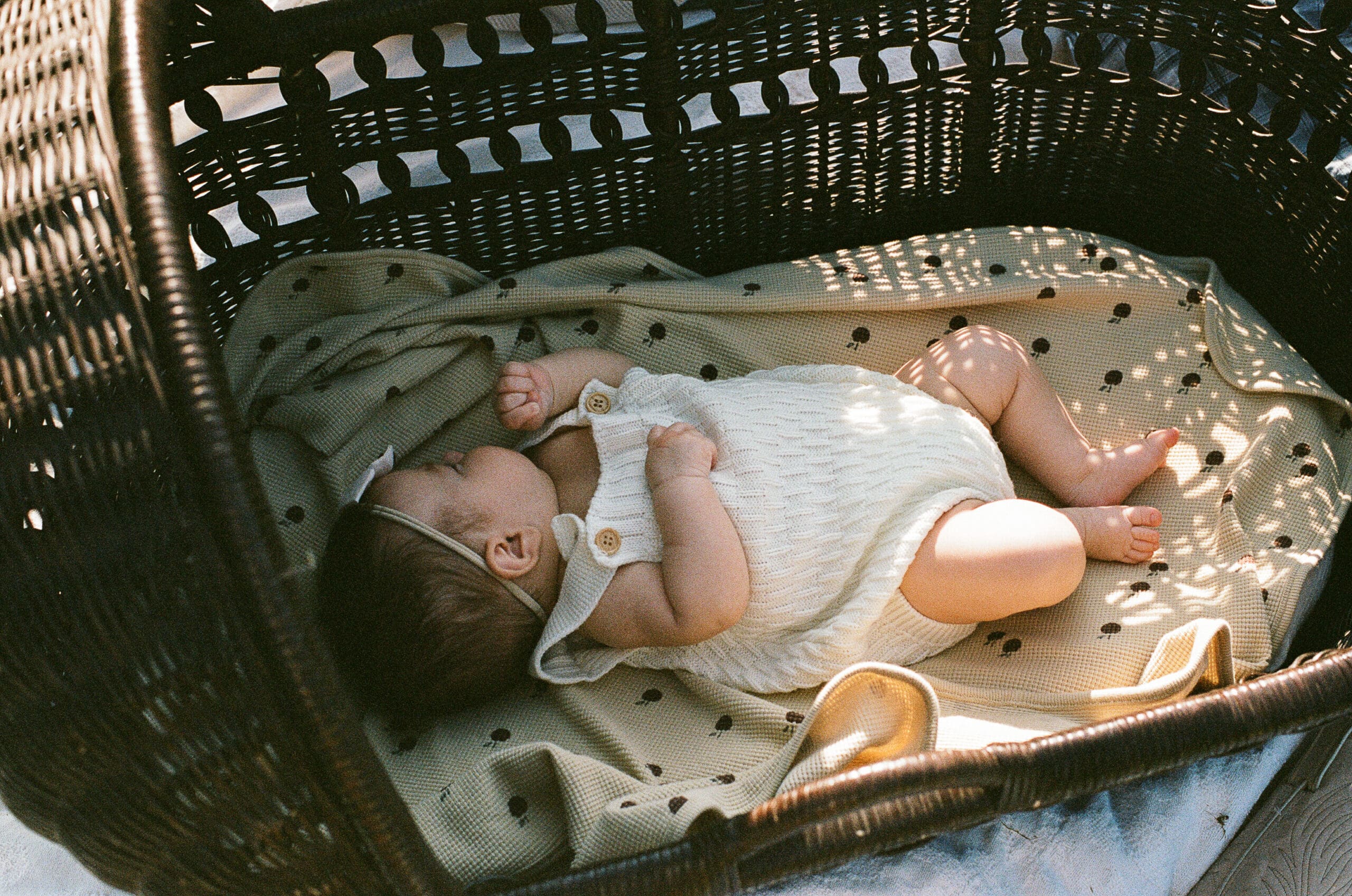 Baby sleeping in bassinet