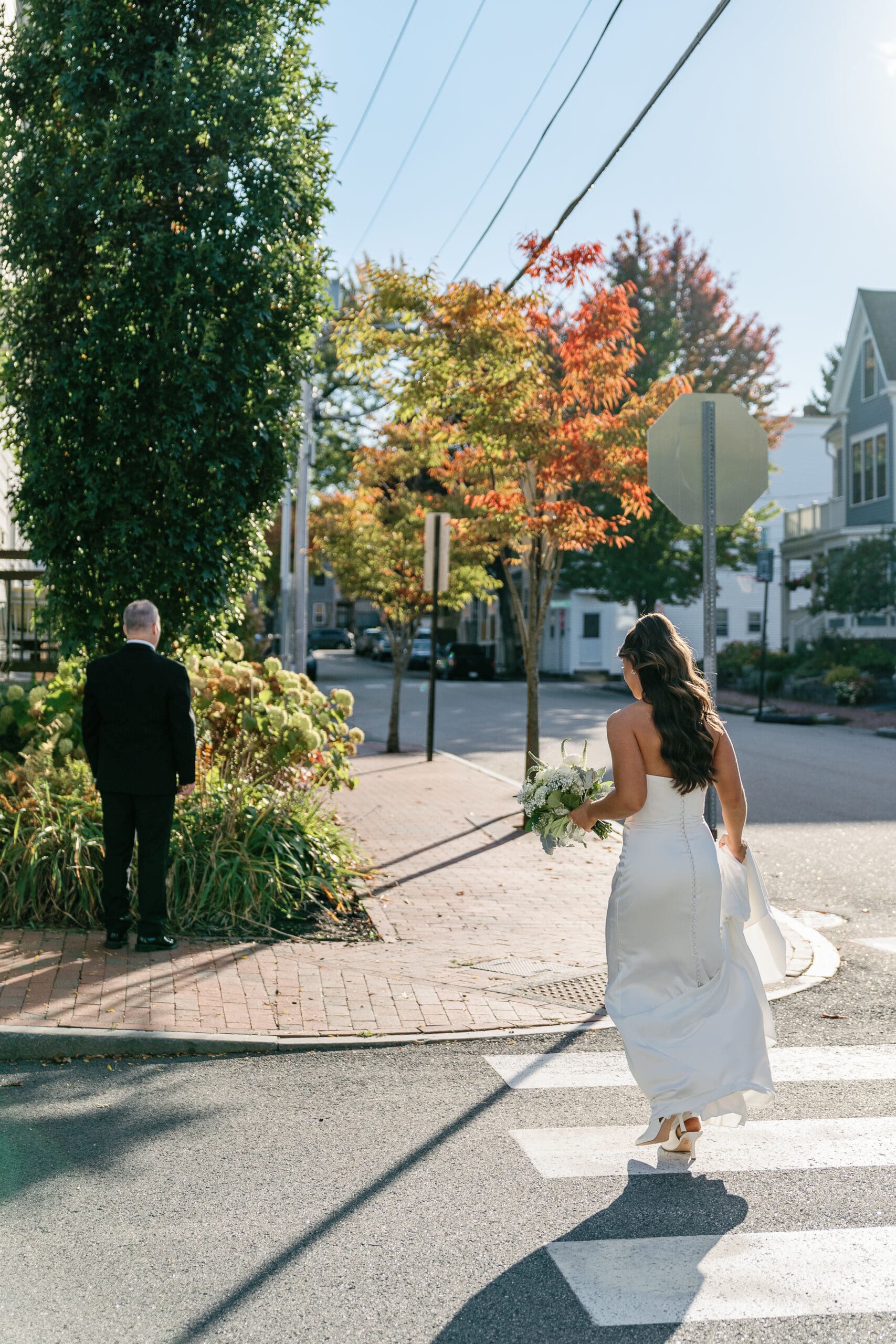 Bride walking towards father for first look by Maine wedding photographer, Shelby Ann Photos